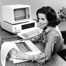 Just like my desk!  A Computer and Typewriter.